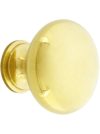 Classic Brass Cabinet Knob - 1 1/4 inch Diameter in Unlacquered Brass.